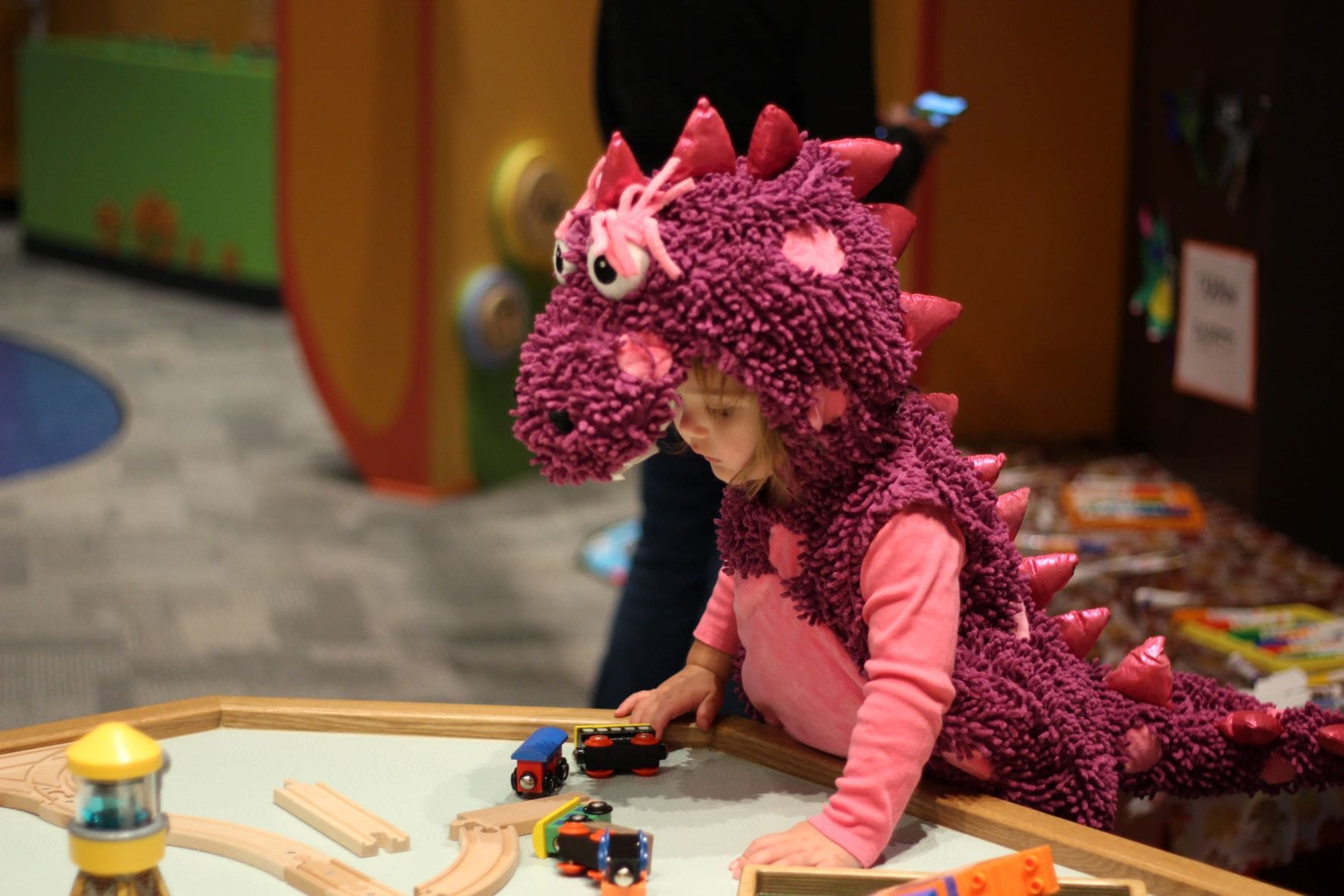 Young girl dressed in a Halloween costume for annual event at Main Street Children's Museum